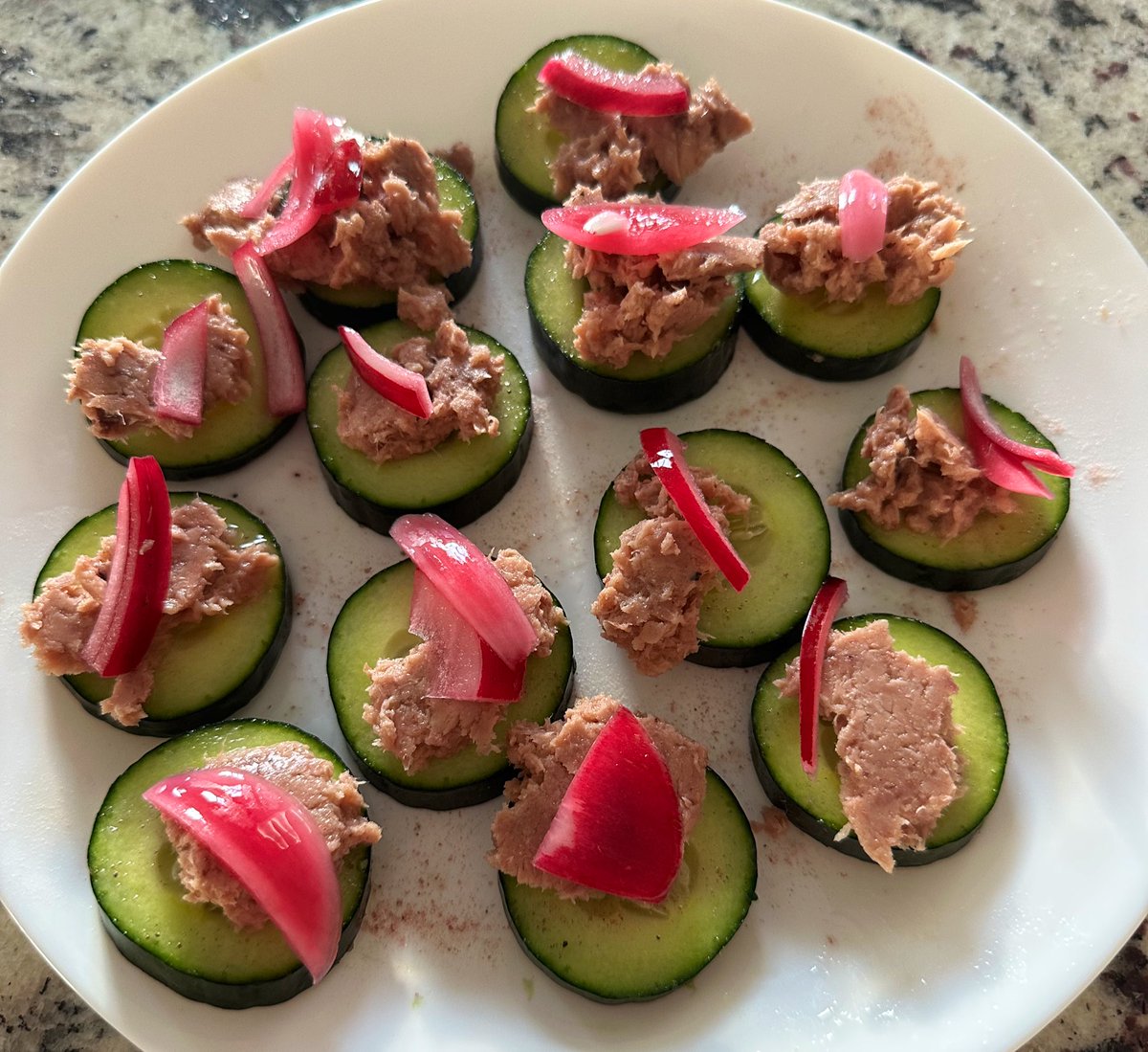 Rate my #lowcarb #afternoon #snack 

#Cucumbers topped with #buffalo #Tuna, #blacksalt and #pickledonions 

Would you eat it?