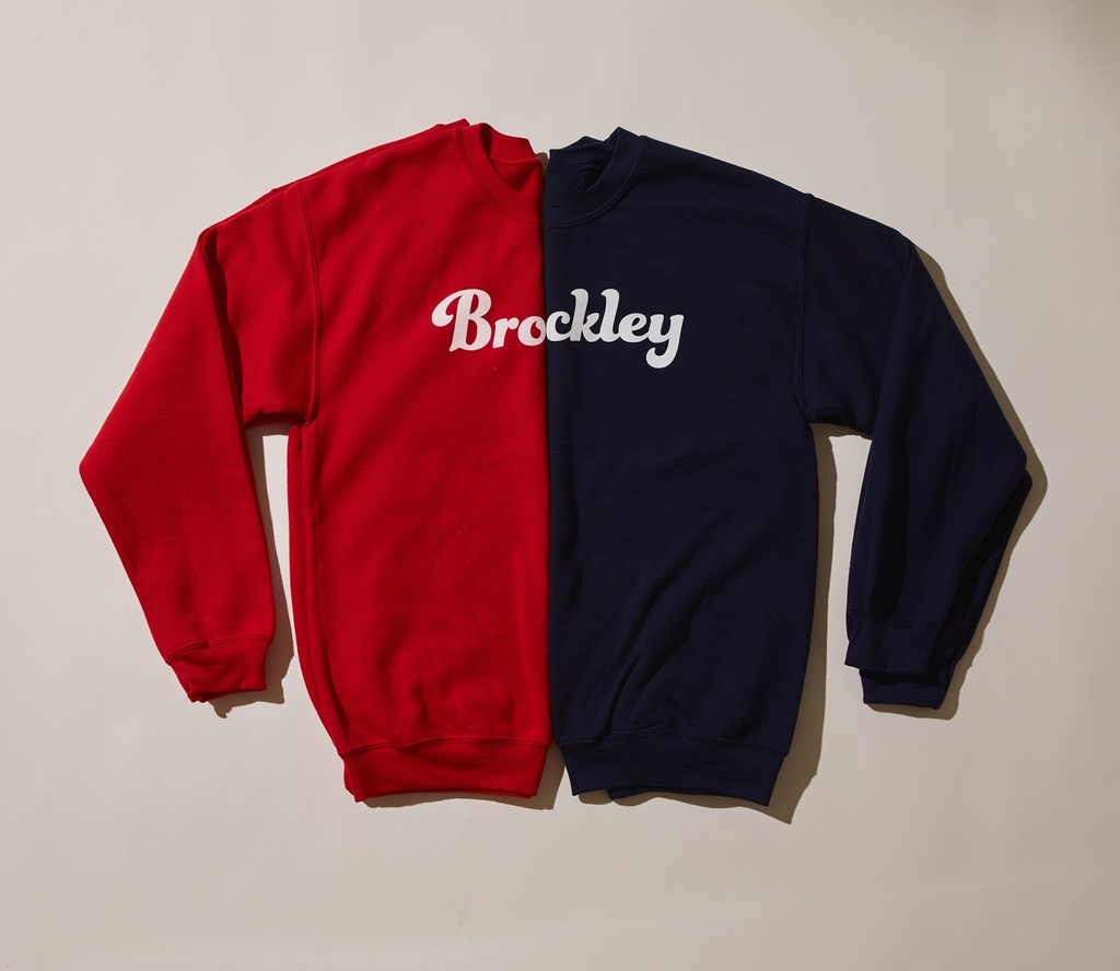 Embrace the #TeamBrockley spirit wholeheartedly with our irresistibly cosy Brockley print sweatshirt. This timeless sweatshirt showcases a classic design, featuring a blend of cotton-fleece fabric that offers the perfect balance of warmth and comfort!