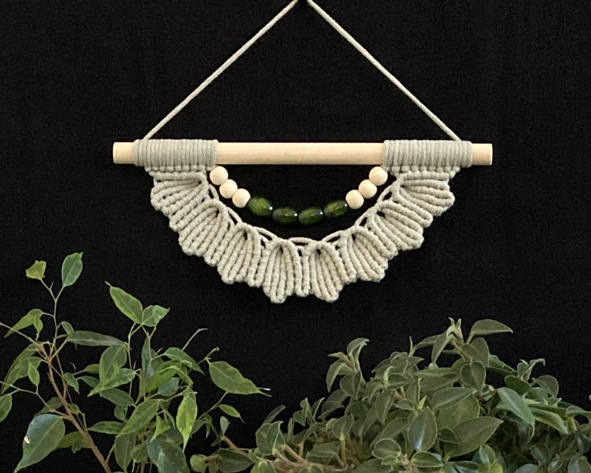 Macrame wall hanging in pale green cord with green and cream beads.  windchimecordncraft.com/shop/handmade-… #macrame #macramewallhanging #Boho
#bohemian #wallart #indoordecor #decoration