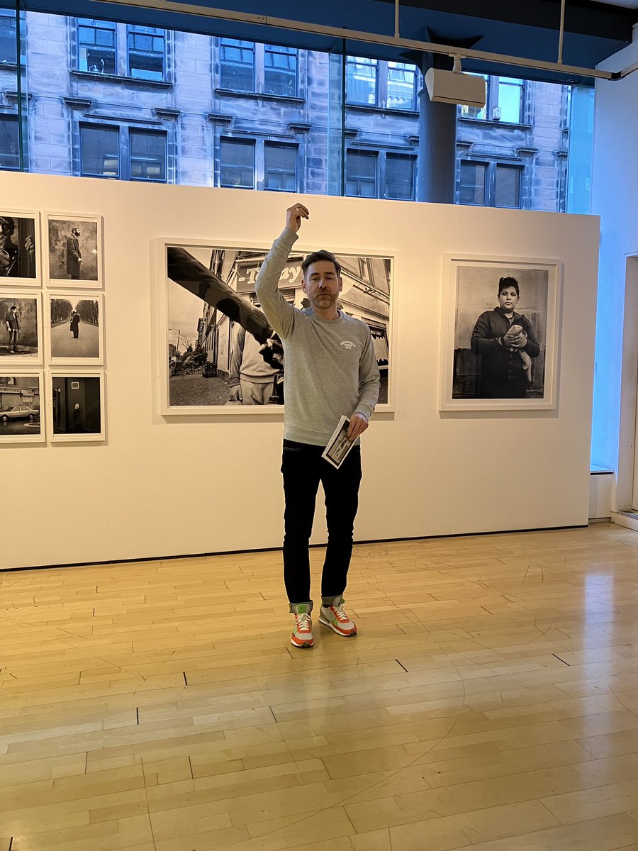 DennistounStyle's tweet photo. Great chat about his work by @simonmurphy7 at his amazing photography exhibition “Govanhill” at @StreetLevel_ There’s evidently a lot of love for these photos. Keeping it real. You’re welcome to the east end anytime. Hauners on hand if required! #govanhill #simonmurphy #glasgow https://t.co/o7zPe9ndf1