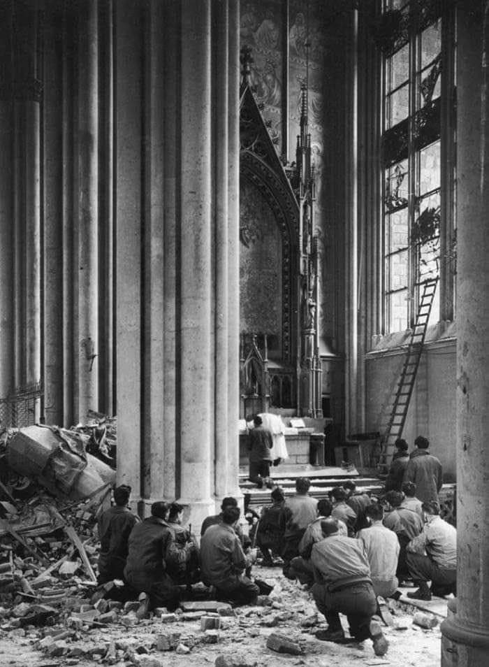 American soldiers attending Holy Mass in the bomb-damaged Cologne Cathedral (March, 1945)

Happy Veterans Day!