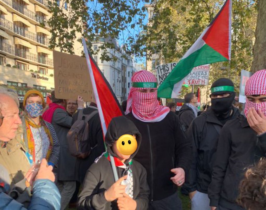 HenMazzig's tweet image. One picture is from Gaza; a proscribed terrorist organization, which burned babies alive and raped little girls, just a few weeks ago. 

The other picture is a “peaceful march” to support this group, in London, today.
