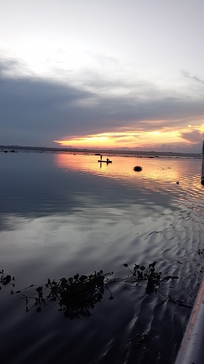 A view of fishermen on the Albertine Nile River in West Nile Uganda. #ExploreUganda #ExploreEastAfrica #VisitUganda #VisitEastAfrica #Yafreeka