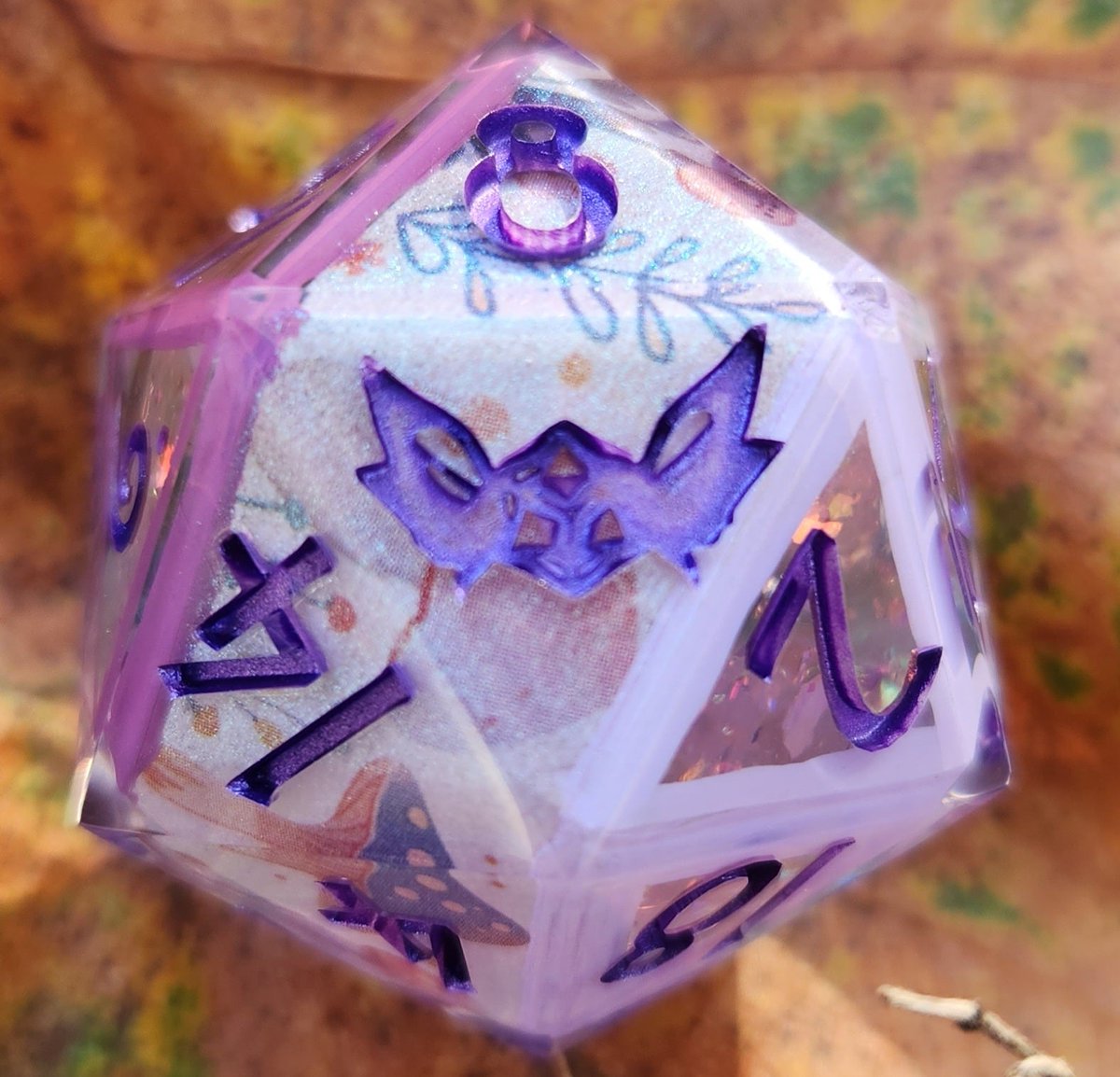 NaevisOddities's tweet photo. 'Flowers &amp; Fairy Circles’ Variant Handmade Shimmery Cottagecore 30mm D20 Dice 👇
This is an oversized 30mm D20 made with custom mold and font exclusive to my shop and my trademarked logo replacing the ... https://t.co/4CDEZy9pXS https://t.co/cIoixhkPPB