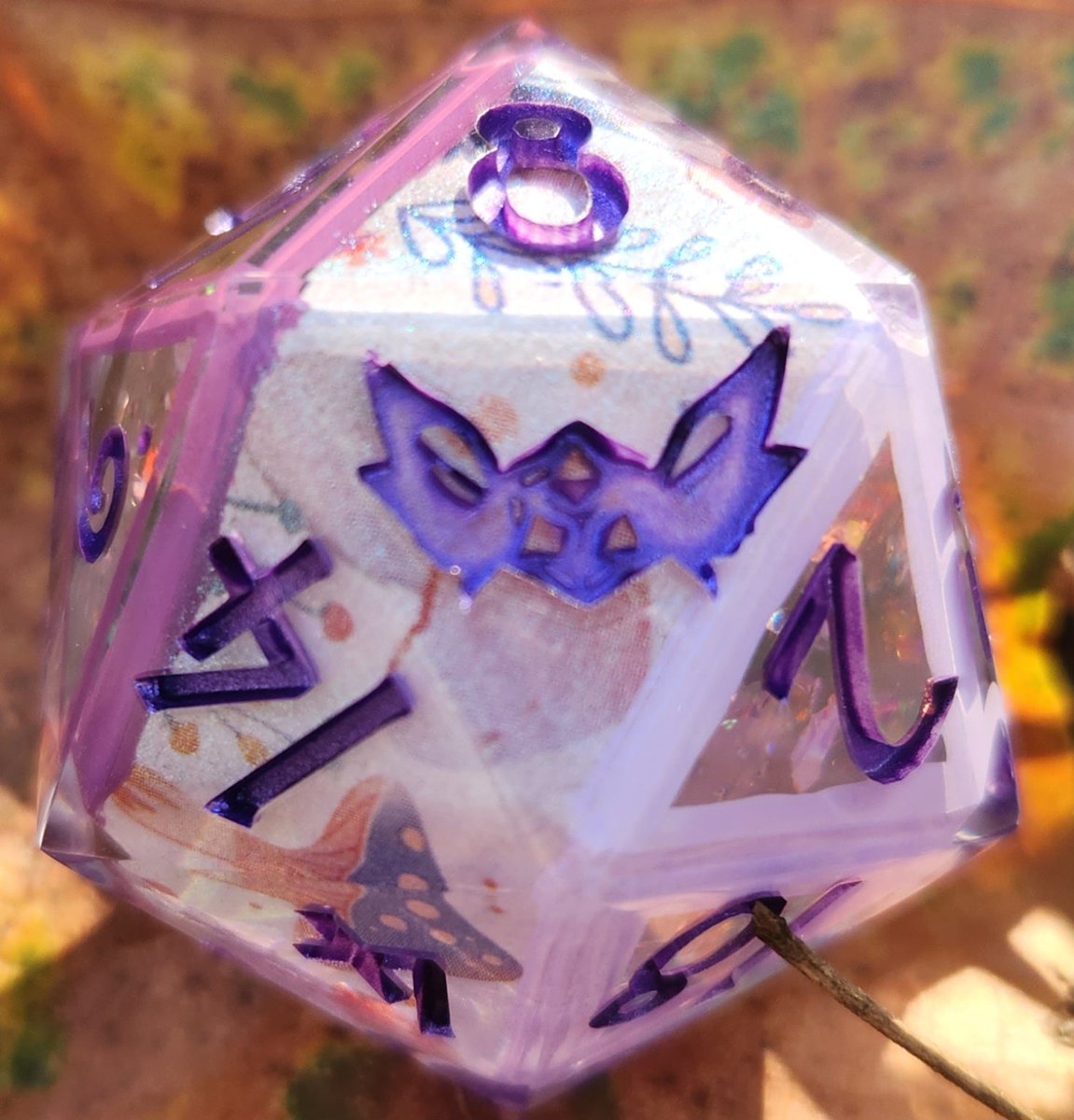 NaevisOddities's tweet photo. 'Flowers &amp; Fairy Circles’ Variant Handmade Shimmery Cottagecore 30mm D20 Dice 👇
This is an oversized 30mm D20 made with custom mold and font exclusive to my shop and my trademarked logo replacing the ... https://t.co/4CDEZy9pXS https://t.co/cIoixhkPPB