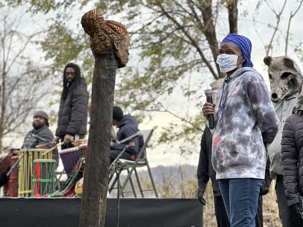 ClimateCorpsPgh's tweet image. Clairton, PA: Ceremonial planting of an Externality carved from a tree burned in PNW wildfires. Overlooking one of the biggest industrial contributors to climate change in PA courtesy of US Steel. #WeRefuseToDie  Worst AQ in the country today too.