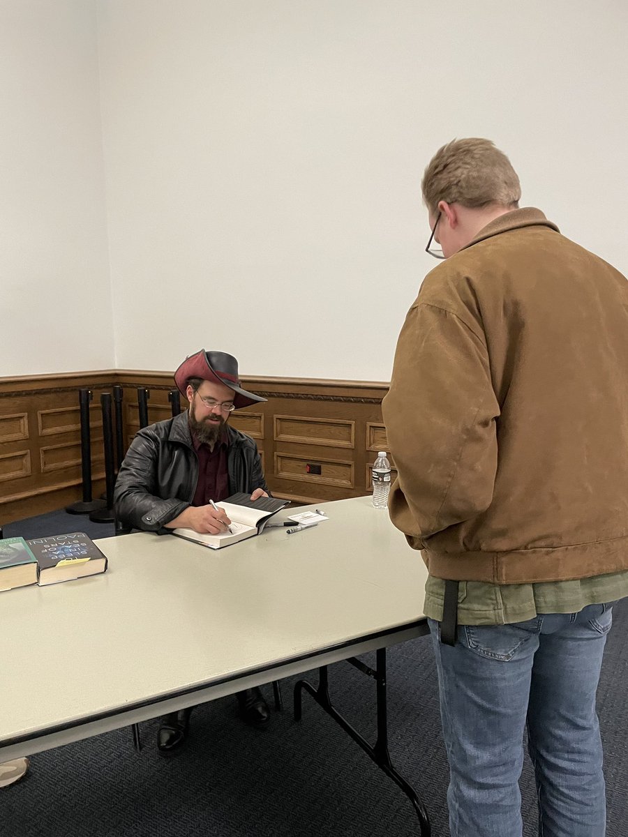 realbowtieguy's tweet photo. Had a blast meeting @paolini and got my all-time favorite book (To Sleep in a Sea of Stars) signed! Do you think we can get a reference to Mr. Stabby slipped into the Fractalverse sequel? https://t.co/lguFIWJ4OY
