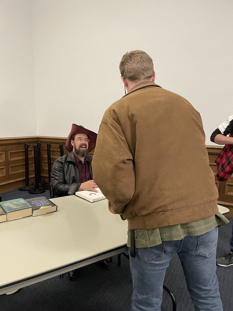 realbowtieguy's tweet photo. Had a blast meeting @paolini and got my all-time favorite book (To Sleep in a Sea of Stars) signed! Do you think we can get a reference to Mr. Stabby slipped into the Fractalverse sequel? https://t.co/lguFIWJ4OY