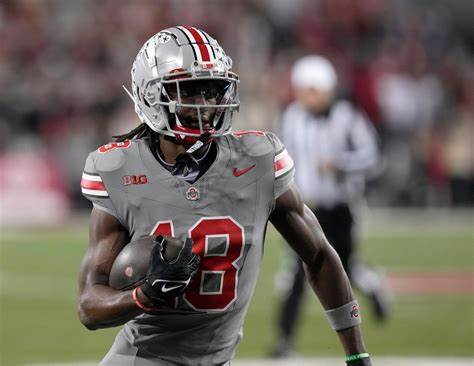nflrums's tweet photo. 🚨 Hesiman Alert 

Ohio Marvin Harrison Jr. at Halftime:

- 6 Receptions 
- 92 Yards
- 19 Rushing Yards
- 3 Total Tds https://t.co/yG3lEapX4P