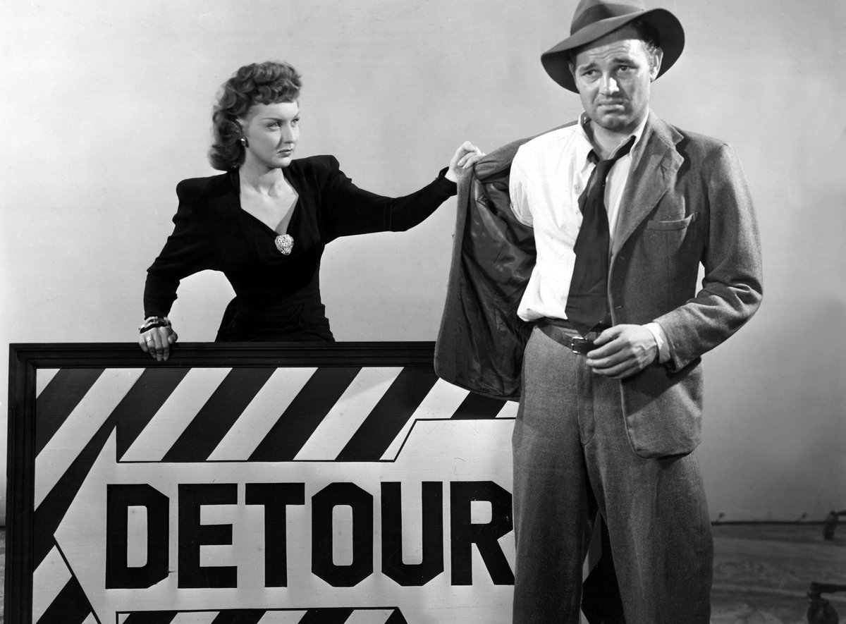 🚗🎬 Talk about life imitating art on the set of 'Detour' (1945)! 🌟 While setting up a hitchhiking scene, a passing car mistook the fabulous Ann Savage (decked out in character) for a real hitchhiker!🎥#Detour1945 #BehindTheScenes #movietrivia