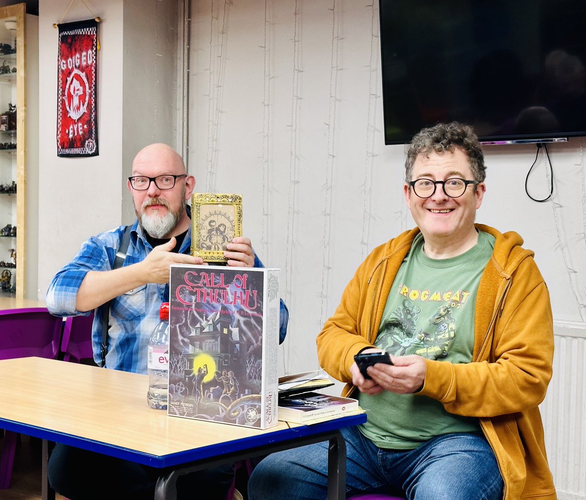 Asako_Soh's tweet photo. Wonderful interview about Call of Cthulhu with @mikemason @Chaosium_Inc with @theGROGNARDfile at #Grogmeet Mike with his hands on the shrine to the actor Caroline Munro https://t.co/ikxpEIpI9Z