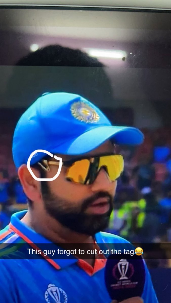 asmemesss's tweet photo. Rohit Sharma forgot to cut the tag of his new shades 😭😭😭 https://t.co/AaL6SGEfiW