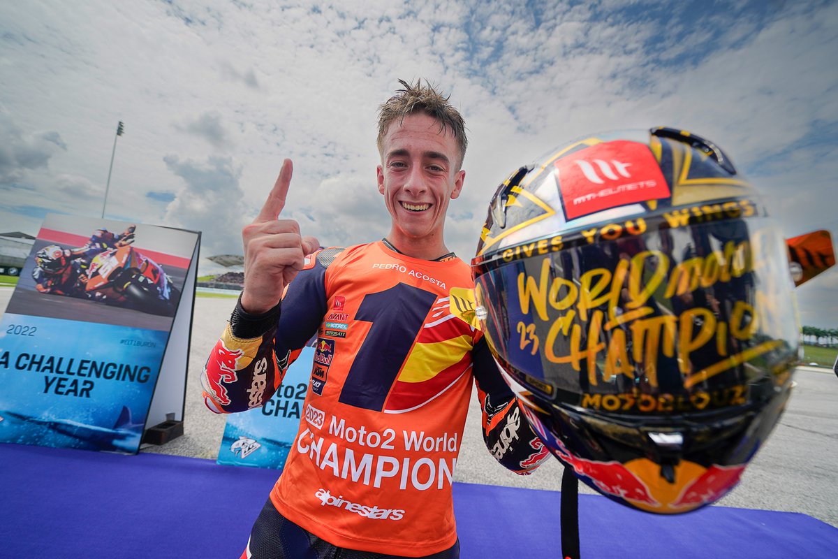 MotoGP's tweet photo. Young but gold! ✨

Yesterday we crowned the first World Champion of the 2023 season and this is how @37_pedroacosta celebrated his #Moto2 title in Sepang! 🏆

#ELT1BURON 🦈 | #MondayMotivation https://t.co/lryMWnWZwB