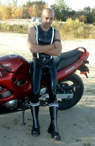 Love this sexy rubberman to bend me over his bike and breed me.