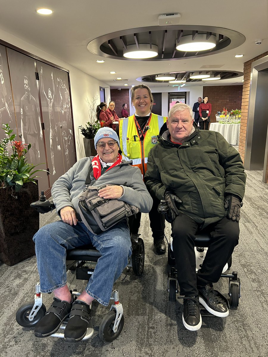 Kyle has travelled from the States to be at Anfield for the first time. Also in the photo is Jo, one of our accessibility stewards who looks after us everywhere we go. Let's hope the Reds give you a big win. Thank you, @LFC, for helping out YNWA