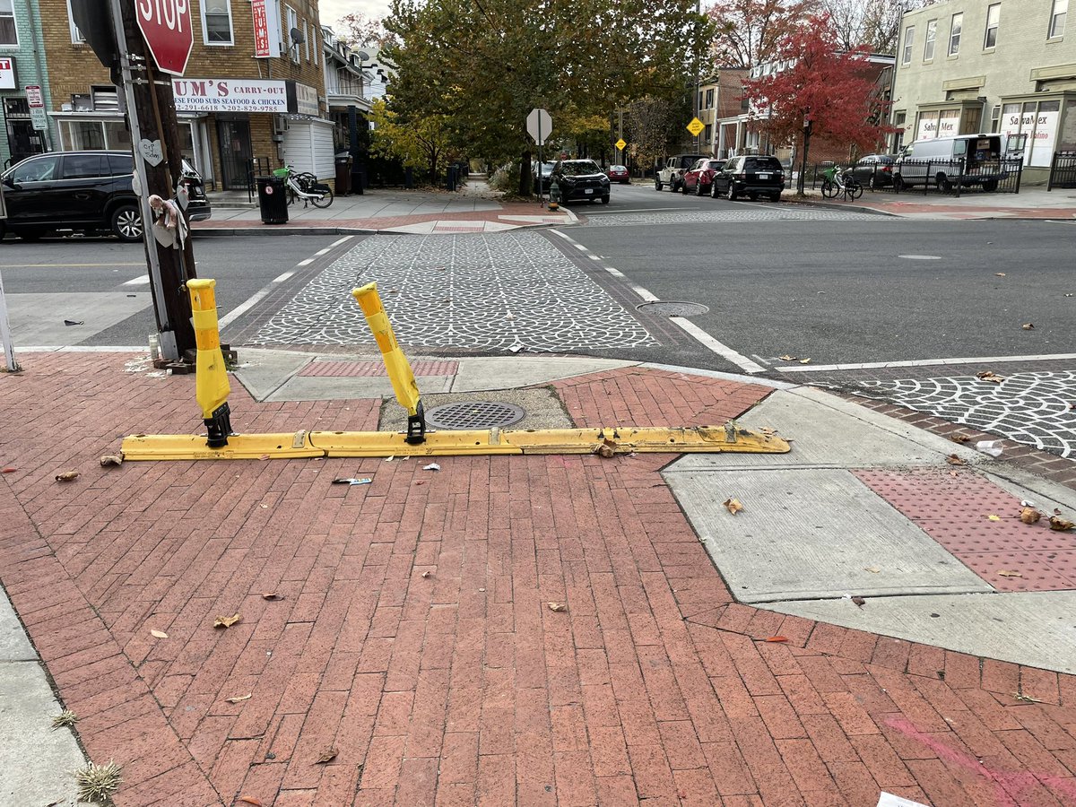 abocq's tweet photo. @311DCgov Morning! Can someone help relocate this traffic calming measure? It’s on the sidewalk at the corner of 7th and Kennedy St NW. Thank you! https://t.co/QUQVy4GmVL