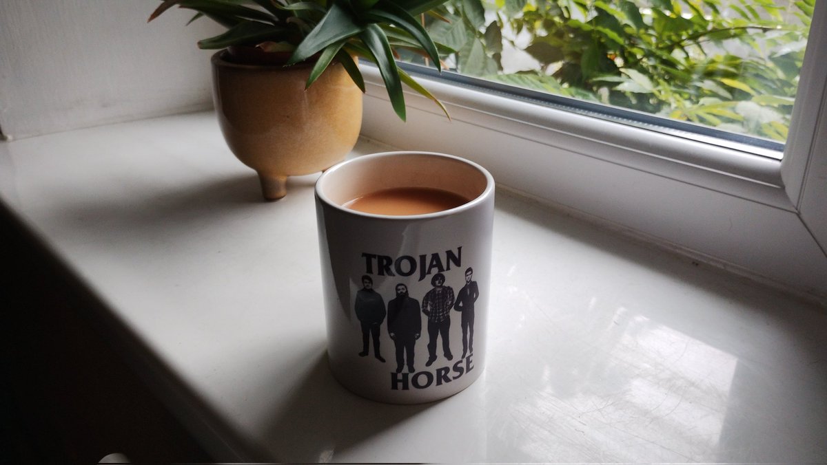 Trojan Horse Musical Industries Merch; Brew Mug, edition 1 of 1. 

Gods bless Vista Print for your "pay the postage and get this item free" service. Now I can drink tea in 7/8. ☕🎶