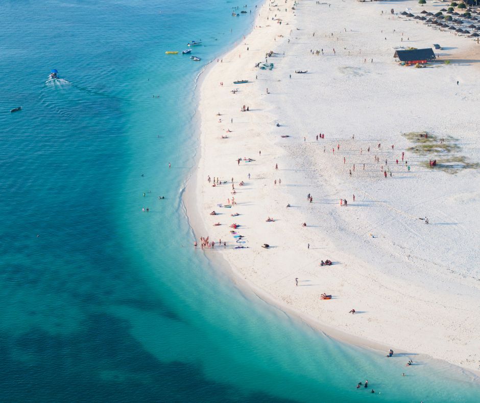 ZanzibarExp's tweet photo. Zanzibar boasts stunning white-sand #beaches and crystal-clear waters. Head to places like Nungwi, Kendwa, or Paje to sunbathe, swim, #snorkel, and enjoy water #sports. https://t.co/1HfbwvWClc