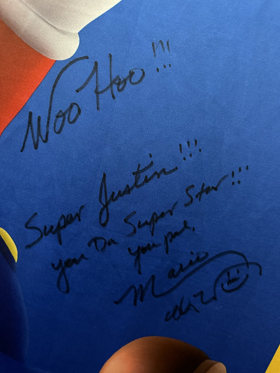 UnicityPoint's tweet image. The 7 foot tall Mario Day banner that I got signed by Charles Martinet is back home and hanging up where it should be 😍