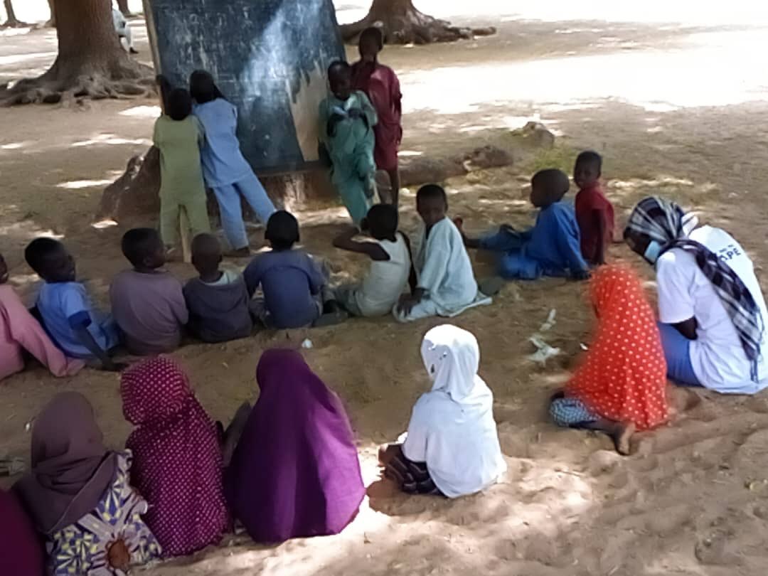 The tree serves as a classroom for some vulnerable children. #KGCHC #educationinnigeria #UBE