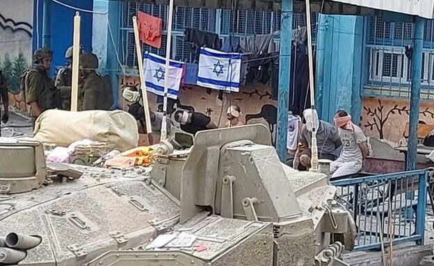 QudsNen's tweet photo. #Israel's military has turned Ghazza Al Jadeeda for Boys UNRWA School into a military base and kidnapped at least six civilians from the neighborhood in order to use them as human shields. #Gaza https://t.co/Q7la0YM8Mc