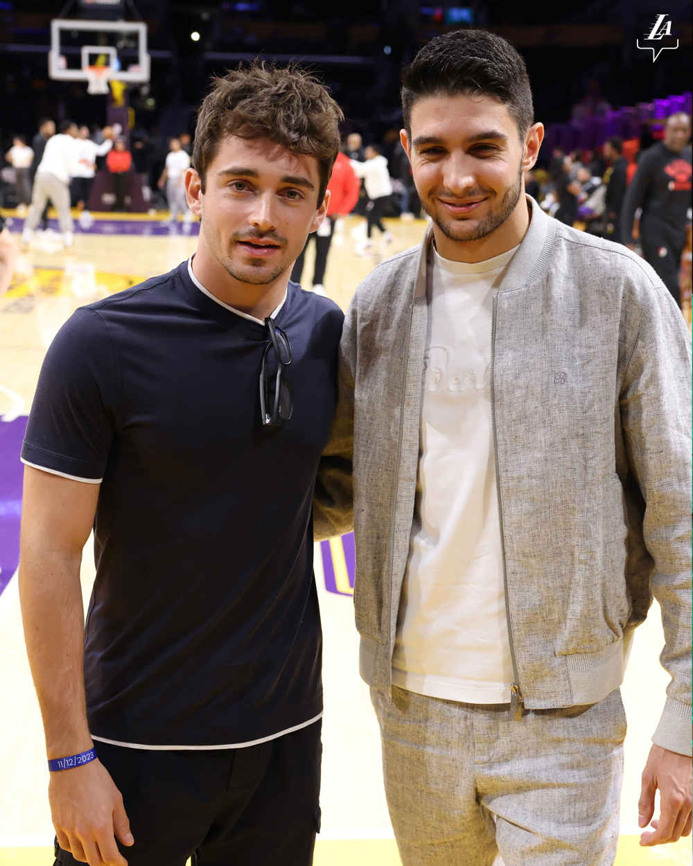 Charles Leclerc attending an LA Lakers basketball game