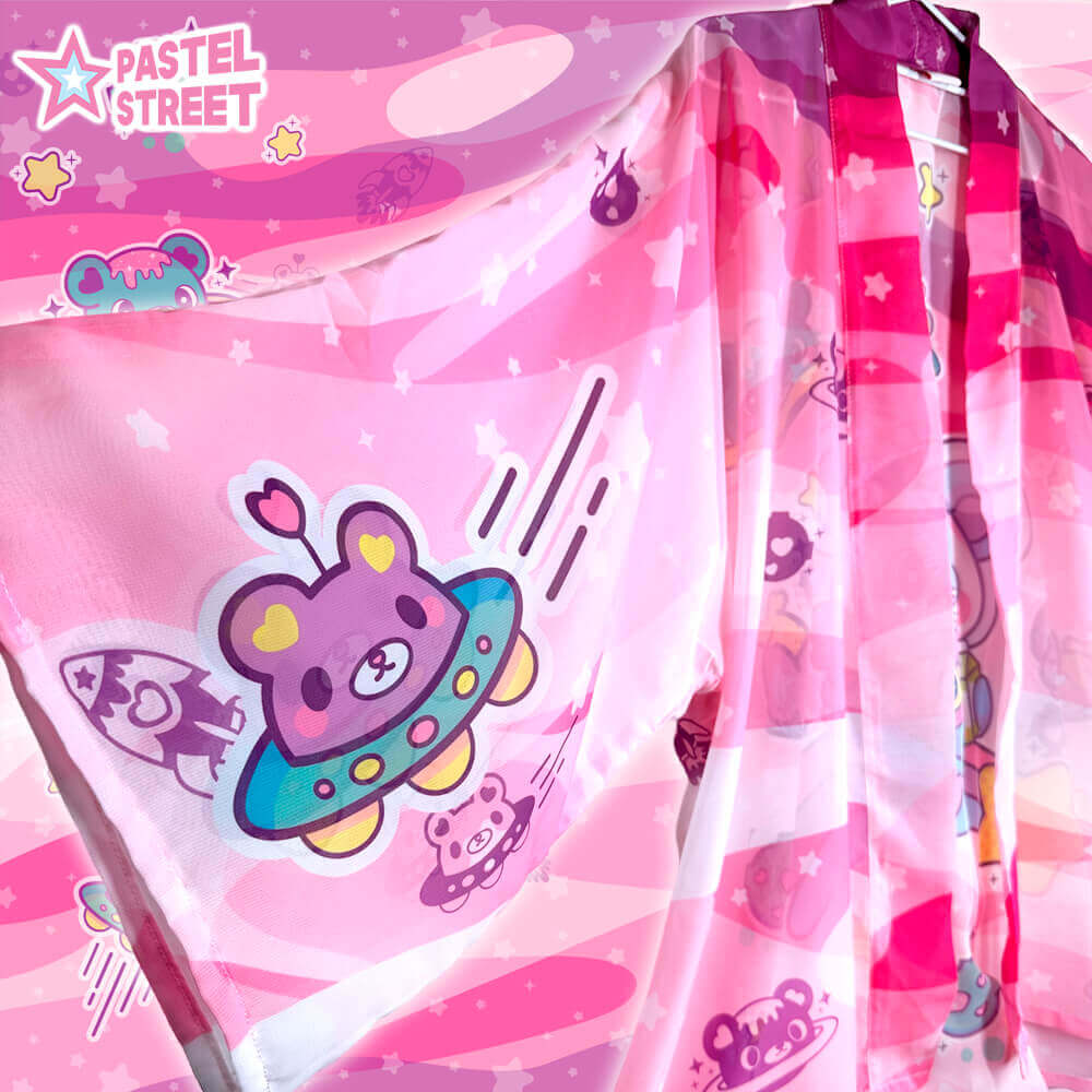 PINKY MILKY WAY CHIFFON JACKET 2023 🐻💕
\( ˙▿˙ )/
One of our very first designs has been improved and restocked! 
(´｡• ᵕ •｡`) 🛸

Now available at 👉 Pastelstreet.com 👈 

ALL DESIGNS RESTOCKED AS WELL! (•̀⌄•́)/ 💖💖💖
#pastelstreet #kawaiifashion #handmade