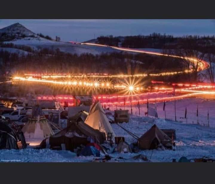 SpottedElk7's tweet image. The night Veterans showed up to Standing Rock. Pilaymaye (Thank you.) 
⚪🟡🔴⚫ 
#WaterisLife 
#NoDapl
#StopDapl