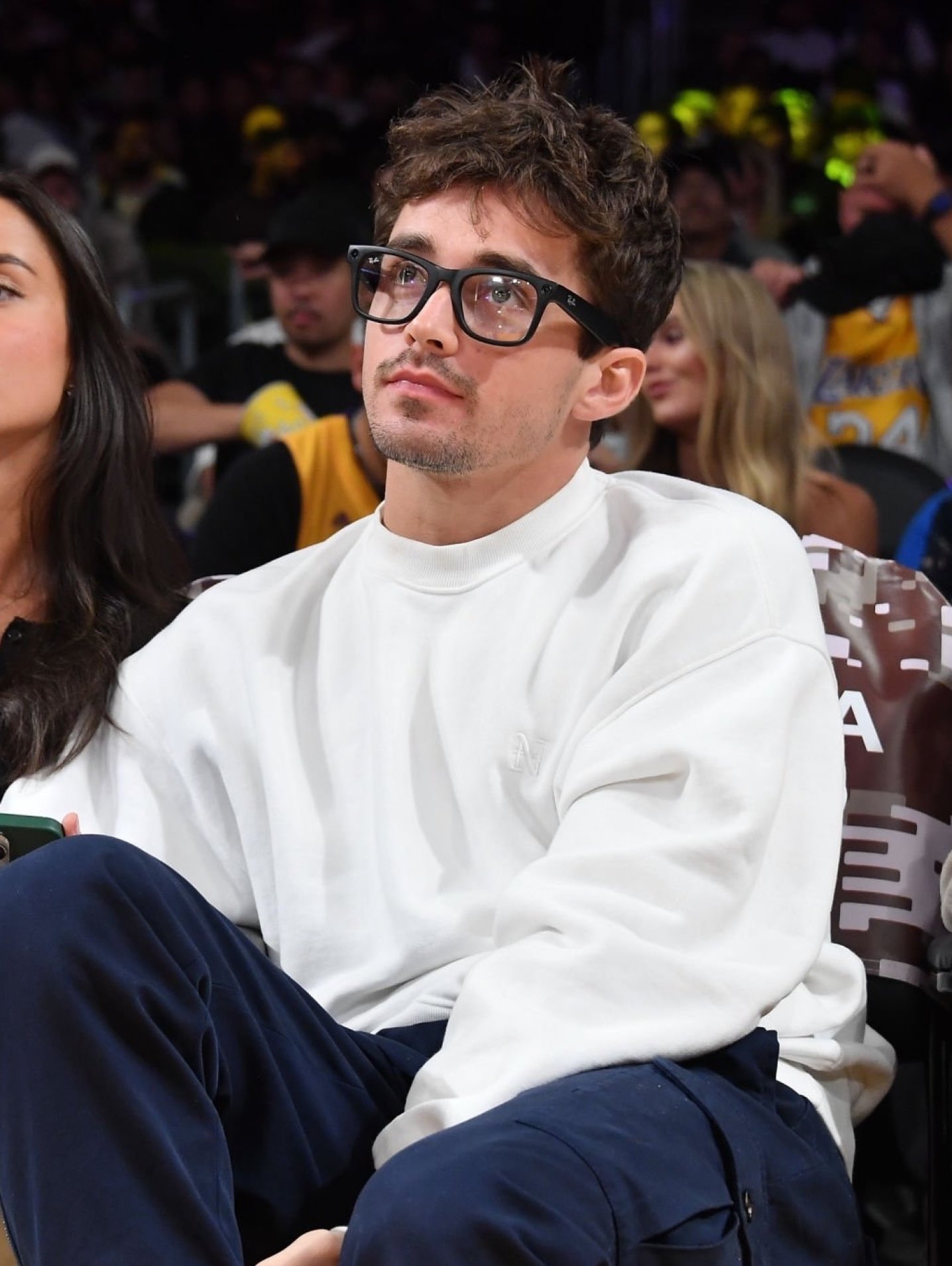 Charles Leclerc attending an LA Lakers basketball game