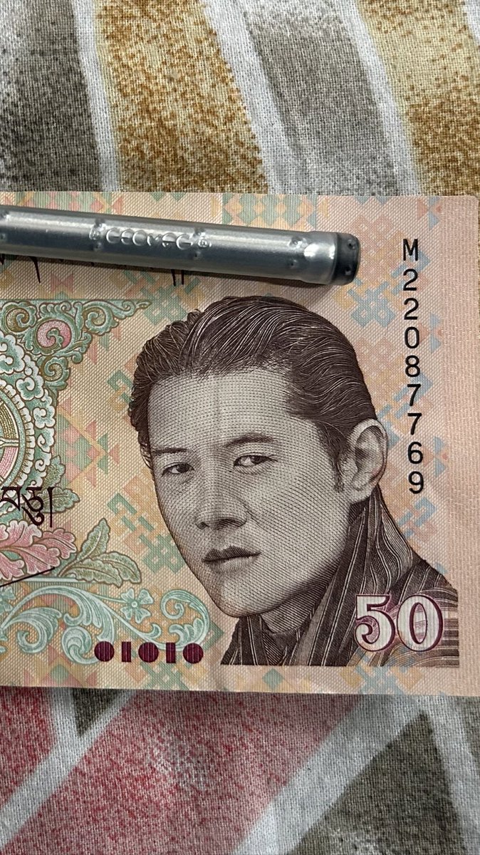 Bhutan money dude has the most swag for a currency note