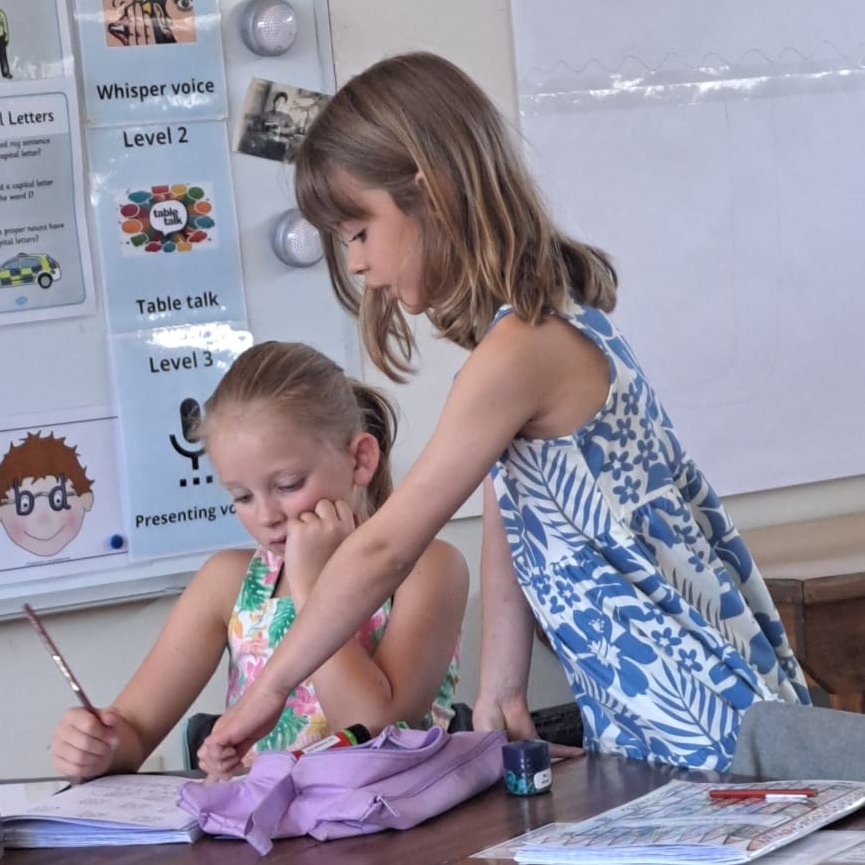 WISNamibia's tweet image. Grade 2 students are collaborating to reinforce their understanding of addition math problems by assisting each other. #mathsisfun #learningatwis #grade2 #primaryschool