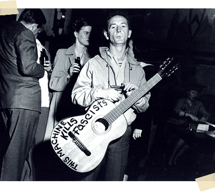radicaldaily's tweet photo. July 14 1912 - Birth of folk singer Woody Guthrie. US folk singer whose songs &amp; recordings inspired politically and musically for decades. https://t.co/jSIYFDjWOO https://t.co/jqqhXEjUa5