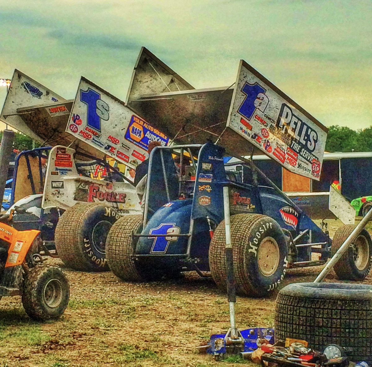 I took this picture on July 29th, 2014 at Oshweken Speedway. I had just spent the week in Canada hanging out with the Shark team. Crew guys slept under the cars in their one trailer pulling 2 cars. They got 1 room so everyone on the team could shower. Tonight they won a million.