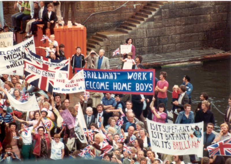 July 12th 1982: HMS Brilliant returns home from the Falklands to wild fanfare and "Brilliant Work! Welcome Home Boys!" as well as this message from her sister ship:

FM HMS BATTLEAXE
TO HMS BRILLIANT

WELCOME HOME. GREAT TO BE IN TOUCH AGAIN.
THE PEACEFUL PEASANTS SALUTE YOU. 
BT