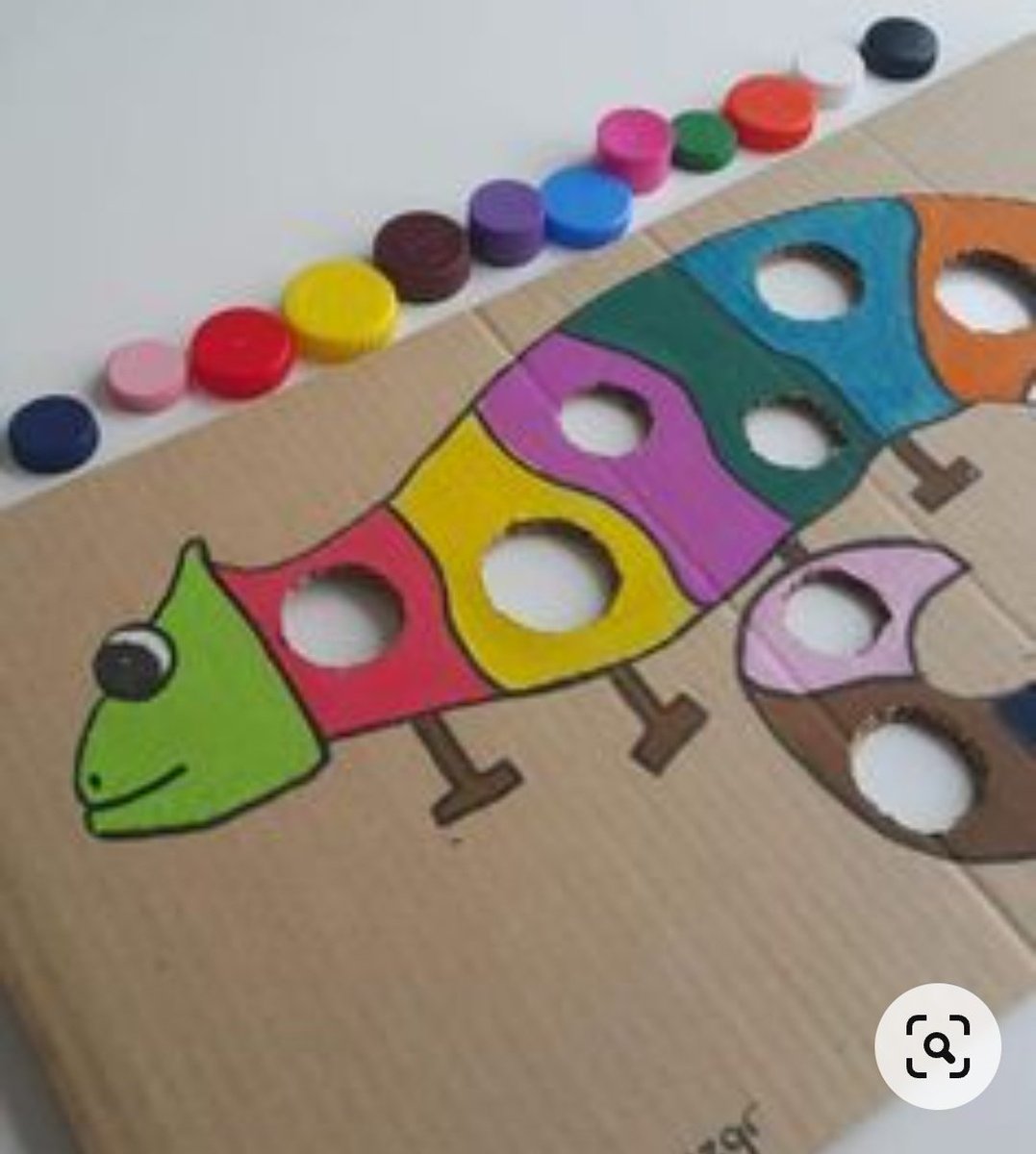 Goodyamara's tweet image. I made this using carton just to teach my toddlers colours, very interesting game. I am a very creative toddler teacher.
