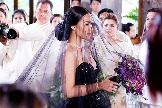 sagiterrorist8's tweet photo. She got married in a black dress?!? ICON!! https://t.co/S0TcJGrrok