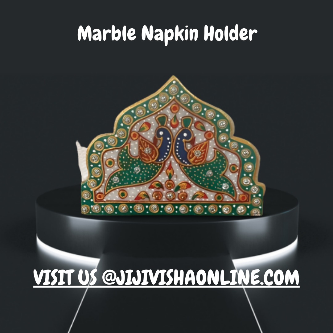 This beautiful napkin holder is handcrafted by skilled artisans and features intricate Meenakari work that is sure to impress your guests. The holder is made from high-quality marble that is both durable and easy to clean.

#handicraft #marble #napkinholder #meenakariwork