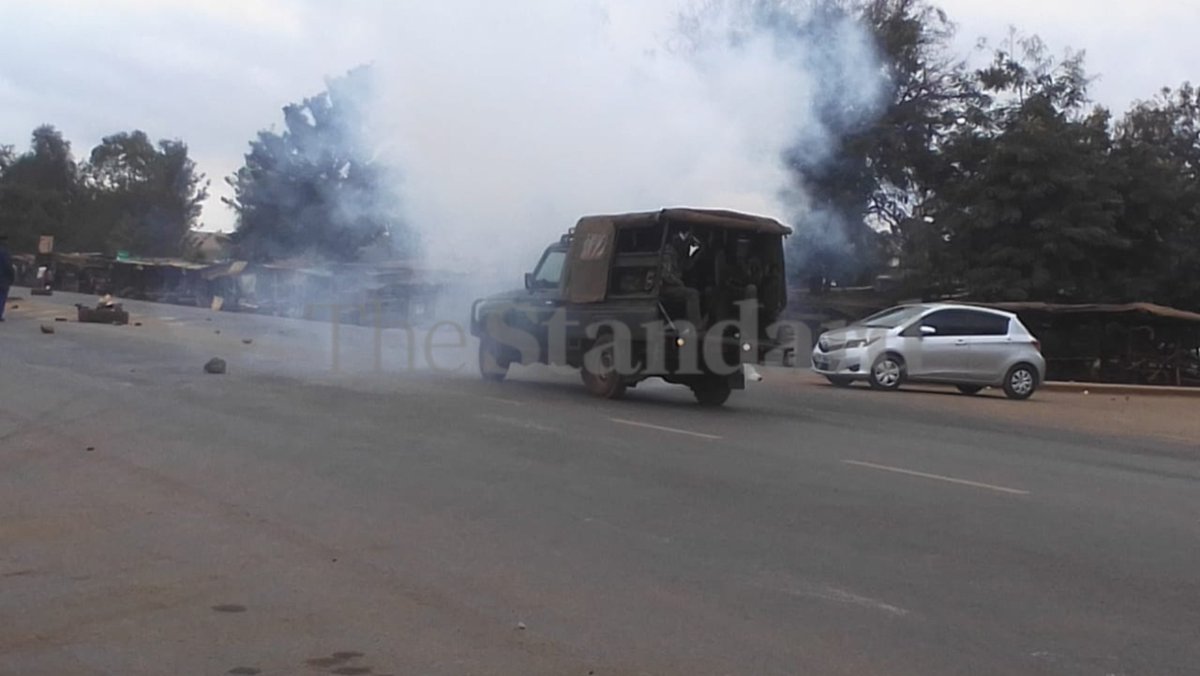 One person feared dead, another injured as police engage protesters who torched a police vehicle in Emali on the Nairobi-Mombasa highway. Photos: Stephen Nzioka