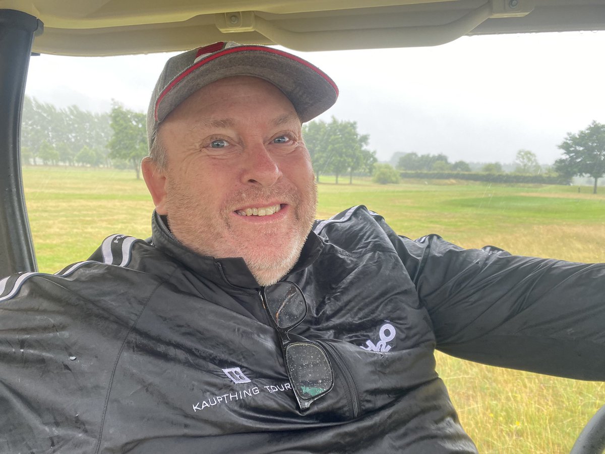 SkyCaddieSteve's tweet photo. Not a great day for photos here @DragorGC , lots of rain , here’s Jan sheltering for a while as we update latest changes & check gps details around the course with the new mapping kit for all @SkyCaddie players #proactiveupdating #groundmapping #uptodateaccuracy https://t.co/oJgiC00cet
