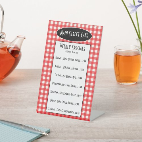 art4artsake7's tweet photo. Retro Cafe Red Gingham Weekly Specials Table Menu Pedestal Sign https://t.co/mo231Y7iwI via @zazzle #smallbusinesses #RestaurantDecor #menu #tablesign #cafe #specialoftheday #specials #weeklyspecials #dailyspecials #redchecks #gingham #retro #bestseller https://t.co/wQLgKj376B