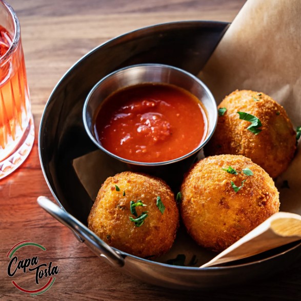capatostadc's tweet photo. Indulge your senses in our modern twist on a beloved classic! Our Arancini is a warm and comforting Italian embrace you never knew you needed. Pull up a chair and make yourself at home at Capa Tosta!

#CapaTosta #CapaTostaDC #ModernMeetsAuthentic #DCsItalianGem https://t.co/Y2loX4rtla