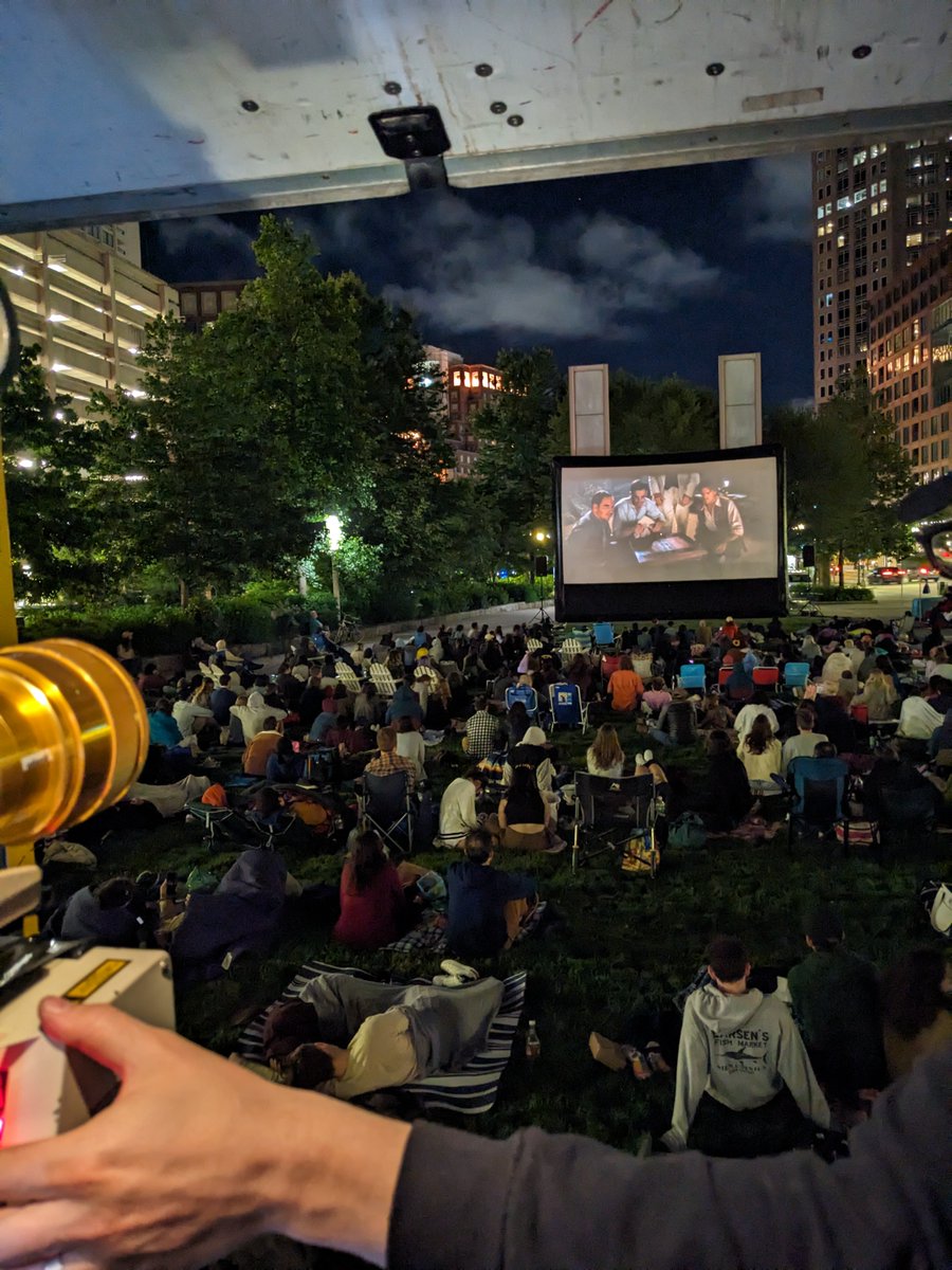 Views from the projection 'booth' 📽️ Tonight at sunset, join us for another free presentation of @scienceonscreen at the @HelloGreenway! See THE LOST WORLD: JURASSIC PARK projected in 35mm—not from a real projection booth, but from the back of a truck!