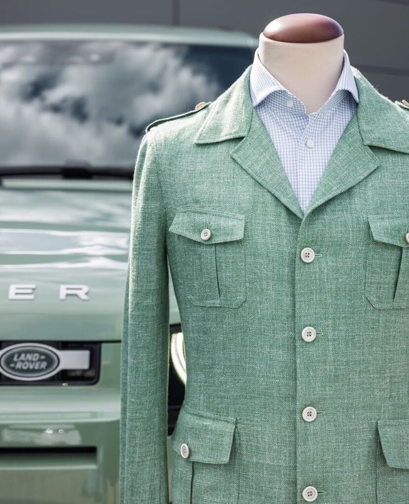 Celebrating 75 years of the Grasmere Green Land Rover Defender first released in 1948, with a Holland &amp; Sherry Apparel “Hopsack” silk/linen/wool blazer styled as a safari jacket. 

#tomjames
#hollandandsherry
#oxxford