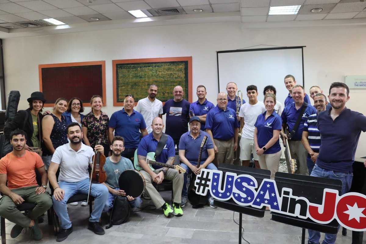 NMC_KHF's tweet photo. We had the incredible honour of teaming up with the @USEmbassyJordan for an unforgettable musical experience. The Air Force Central Band took the stage at the National Music Conservatory, joining forces with our talented students for a jam session!. 🎶🎼
 @KHF_NHF https://t.co/Xdn0WPT0dE