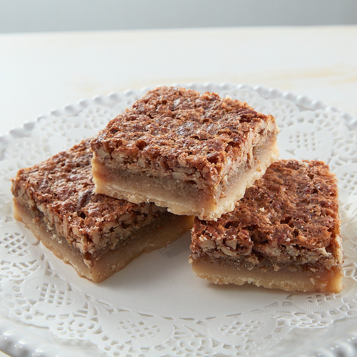 It's classic 🥧 Pecan Pie, but in a perfectly portioned bar! Come by the Café and try one of these for National Pecan Pie Day. 😉