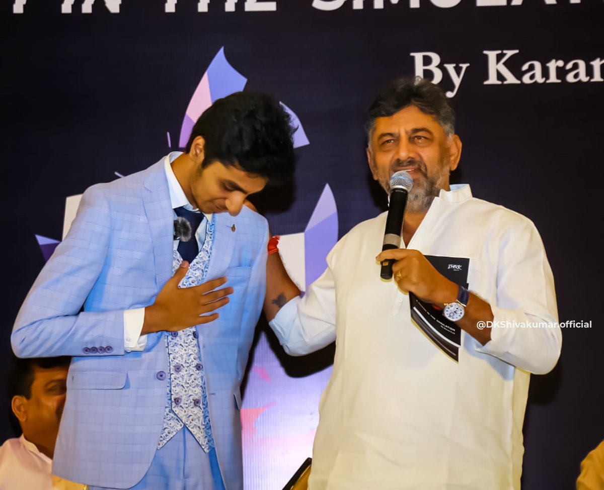DKShivakumar's tweet photo. ಸಚಿವರಾದ ಶ್ರೀ ಸಂತೋಷ್ ಲಾಡ್ ಅವರ ಪುತ್ರ ಬರೆದಿರುವ 'A Glitch In the Simulation' ಪುಸ್ತಕವನ್ನು ಬೆಂಗಳೂರಿನಲ್ಲಿ ಇಂದು ಬಿಡುಗಡೆಗೊಳಿಸಿದೆ. ಸಾಹಿತ್ಯದ ಅಭಿರುಚಿಯನ್ನು ಮೈಗೂಡಿಸಿಕೊಂಡಿರುವ ಅವರ ಪುತ್ರ ಕರಣ್ ಅವರ ಸಾಧನೆಗೆ ಮೆಚ್ಚುಗೆ ವ್ಯಕ್ತಪಡಿಸಿದೆ. https://t.co/ex0heMxO1J