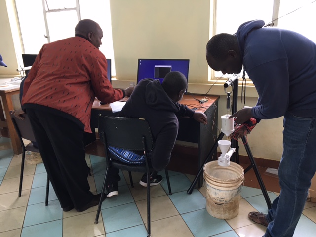 COMETMetEd's tweet photo. Members of the @MeteoKenya (KMD) calibrate a tipping bucket rain gauge for the 3D-PAWS (3D-Printed Automatic Weather Station). Martin Steinson of COMET has been working with the KMD to fabricate 3D-PAWS in support of the Famine Early Warning System Network (@FEWSNET ). https://t.co/RfzFOJvfcy