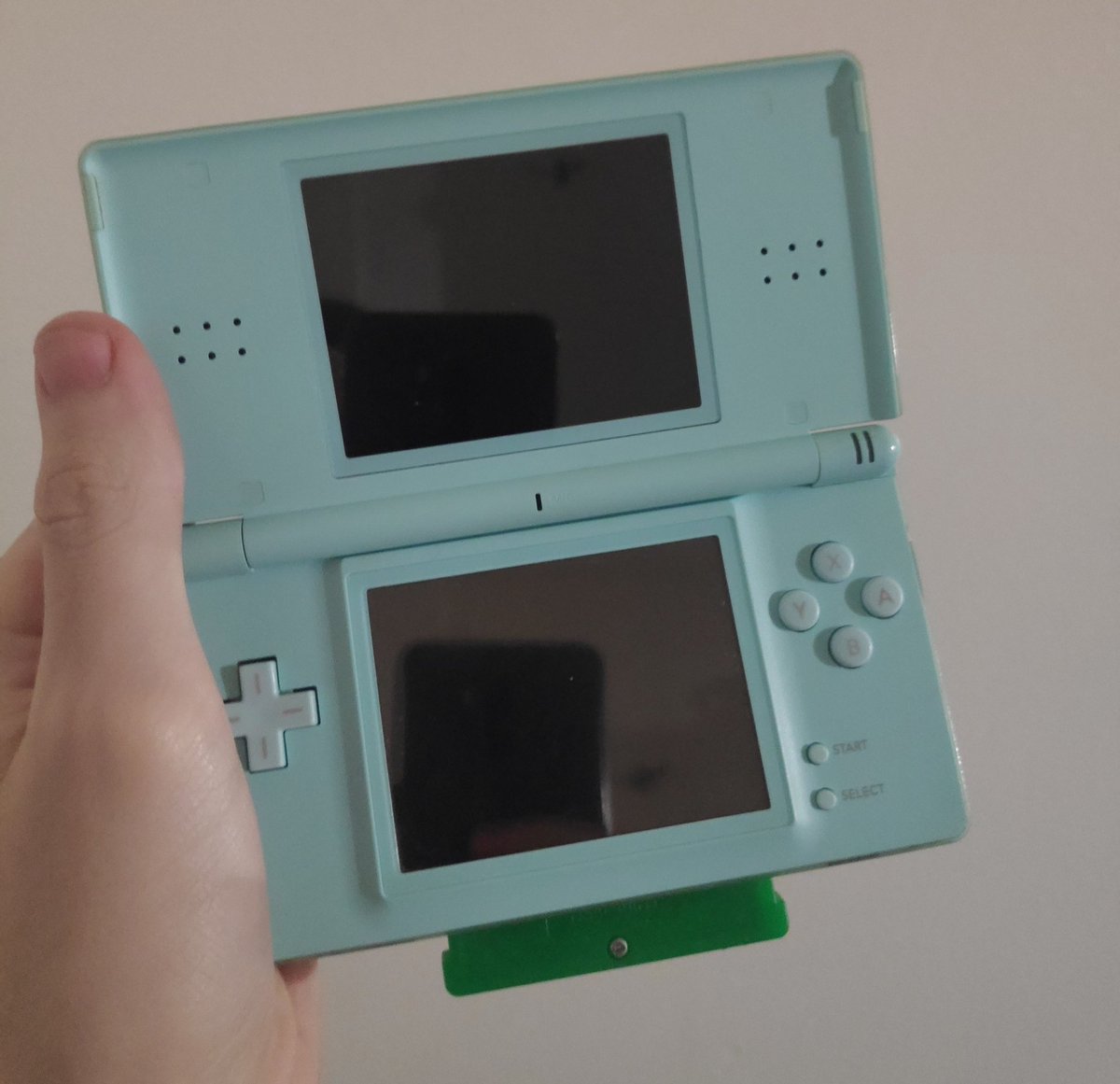 sangamoder's tweet photo. Ngl the way GBA games bulge out the bottom of DS Lites is low-key transfem coded. https://t.co/2HrRtR7YFi