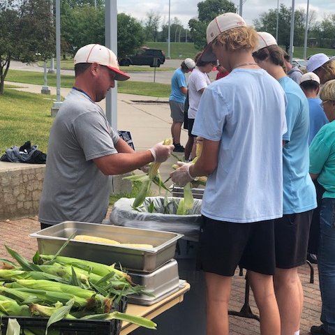 <a href="/RPSSchoolMeals/">Ralston Public Schools Food Service</a> received a grant to purchase locally grown produce to serve to students.  RPS purchased 1,000 ears of sweet corn in Ashland.  The <a href="/BaseballRalston/">Ralston Rams Baseball</a> team volunteered their time to shuck the corn so the food service team could freeze the ears to use early this year.