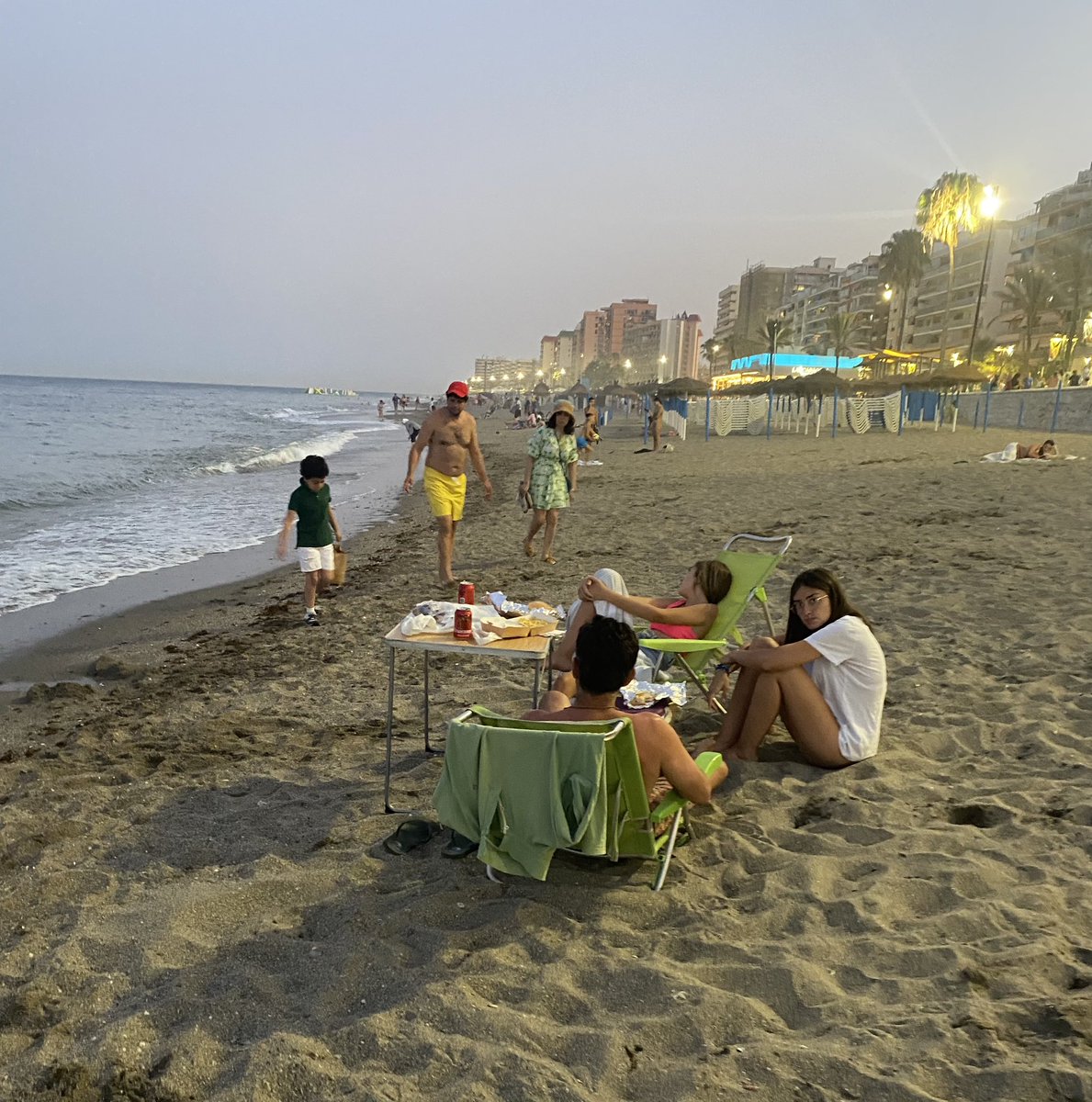 Dining out in hot temperatures 10 pm on beach in Fuengirola